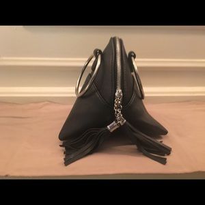 Triangular handbag